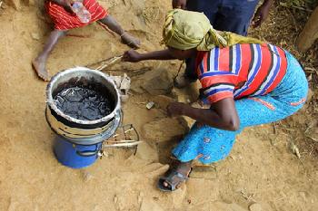 Kenyan cooking on an EcoZoom Rocket stove.