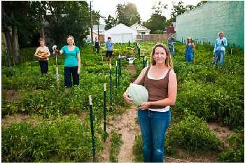 Neighbors working in a homesteading cooperative garden.