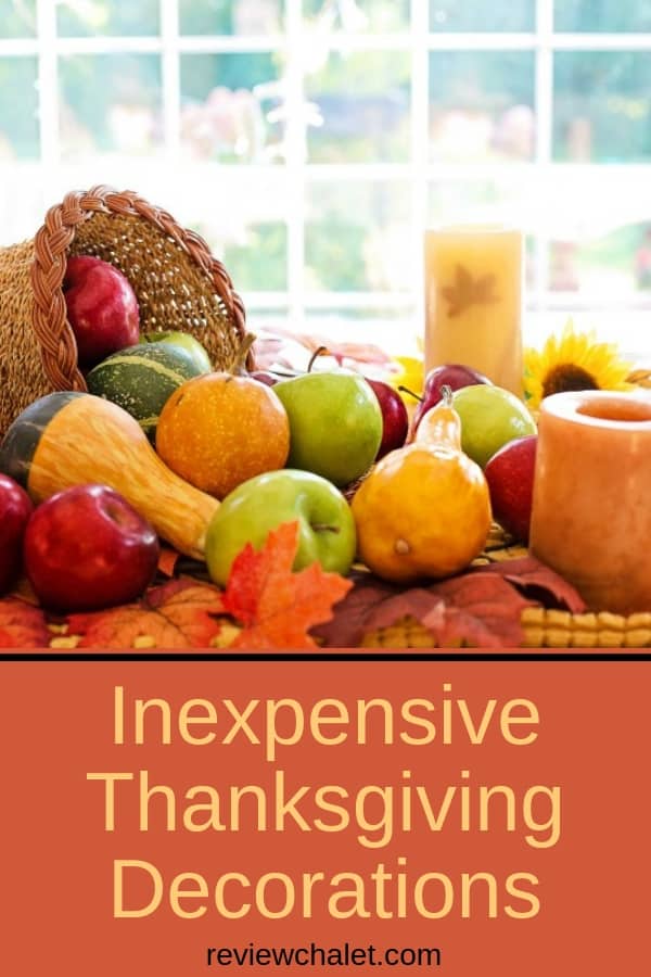 Need some inexpensive Thanksgiving decorations? Here are a few ideas to get you inspired. From crunchy leaves you can find in your backyard to paper pumpkins, and fall candles, you'll find an idea that's perfect for your home. #thanksgiving #thanksgivingdecorations #inexpensivehomedecor #holidaydecorations #rch