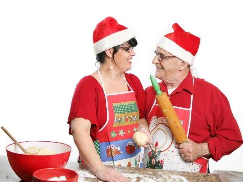 Couple decked out in Christmas outfits